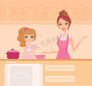 帮妈妈做饭摄影照片_快乐的妈妈帮女儿在厨房做饭
