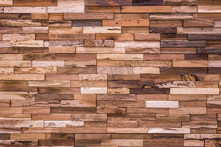 木砖墙质地、木质背景、美丽的抽象瓷砖、由各种木材制成的砖块。
