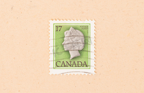 70年摄影照片_加拿大 — 大约 1970 年：在加拿大打印的邮票显示女王，