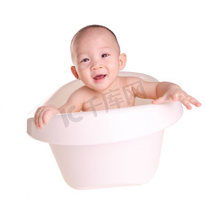小男生在洗澡摄影照片_“宝贝男孩，亚洲可爱的宝宝在浴缸里洗澡”
