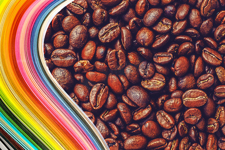 在烤咖啡豆背景的抽象颜色波浪卷曲彩虹条纸