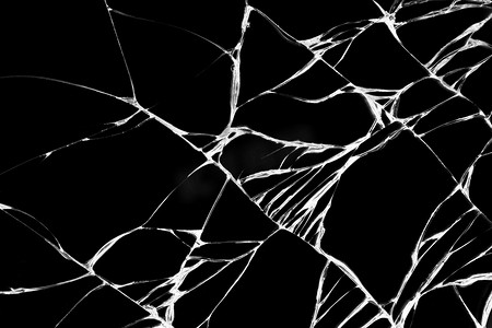 智能手机的破裂的黑玻璃作为设计的背景。
