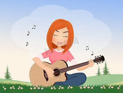 坐弹吉他摄影照片_坐在草地上弹吉他的女孩