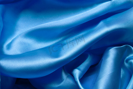 光滑优雅的深蓝色丝绸可以用作背景