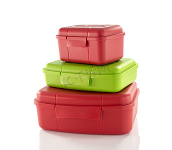 一堆红色和绿色的饭盒