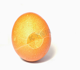 砸蛋摄影照片_裂开的鸡蛋