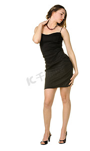 黑裙子摄影照片_穿黑裙子的女人。