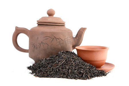 小茶壶摄影照片_杯子和茶的茶壶
