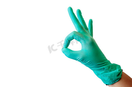 女性手上的蓝色乳胶医用手套，在白色背景下显示出良好的性格。