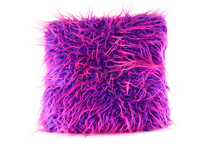 紫色和粉红色的毛茸茸的枕头