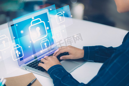 数字网络和网络安全，确保数据安全和隐私，商人使用笔记本电脑，同时展示未来派虚拟锁卫，保护犯罪和黑客，商业理念。