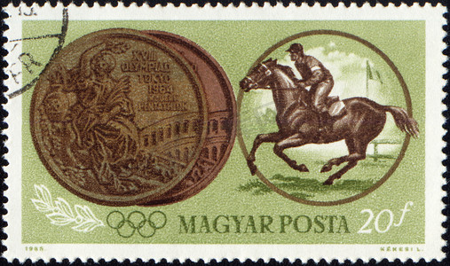 邮票上的运动员骑马和奥运奖牌