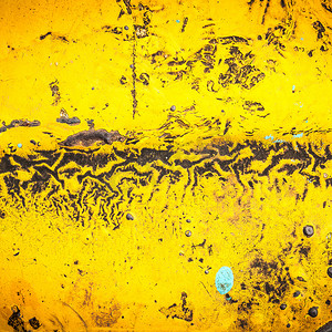 钢琴级烤漆摄影照片_深色钢地板烤漆黄色花纹