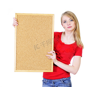 木板广告摄影照片_拿着软木板的年轻金发女人
