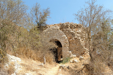 金色圆弧摄影照片_地中海风景中旧石屋的废墟