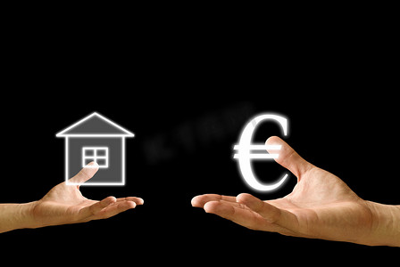 小图标金融摄影照片_小手交换欧元图标与大手的房子图标