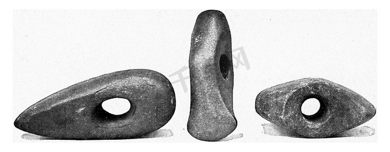 复古风茶杯摄影照片_最近石器时代的燧石轴，复古雕刻。