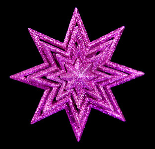 分割线紫色摄影照片_反对黑色的紫色圣诞星