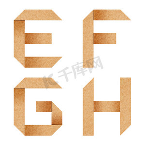 字g摄影照片_“E、F、G、H 用再生纸折纸字母”