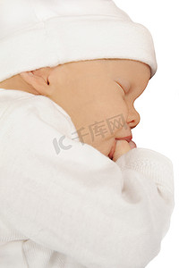 初生婴儿摄影照片_初生婴儿吮吸她的拇指