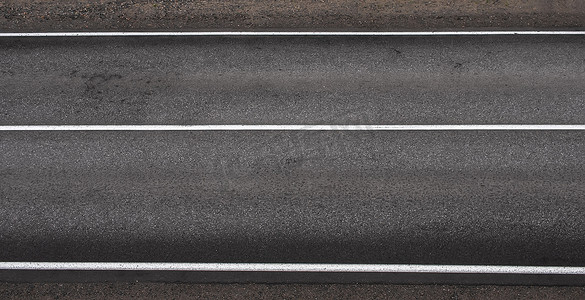 具有三个白色条纹的沥青公路纹理