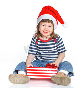 圣诞老人帽子的小女孩有礼物盒的