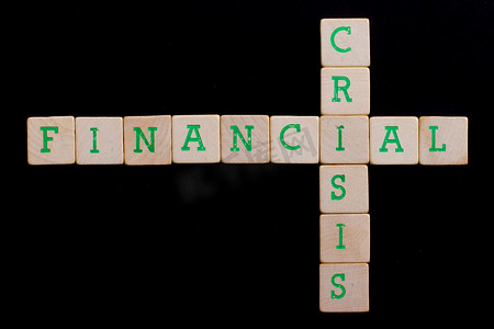 绿色金融摄影照片_旧木块上的字母（金融、危机）