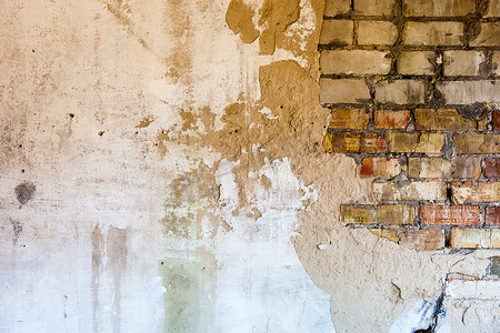 熬制膏药摄影照片_有损坏的膏药的老砖墙