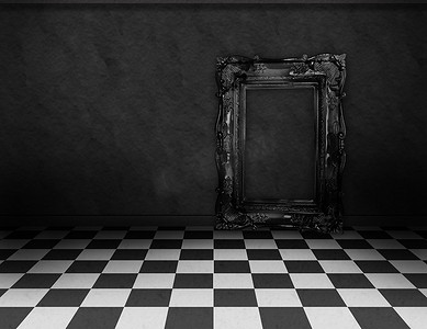 黑白格子格子摄影照片_地板上有黑白格子和空黑框的房间