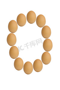 数字字体0摄影照片_白色背景上孤立的棕色鸡蛋字母表中的数字 0 到 9