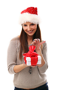 戴着圣诞帽微笑着拿着礼物的可爱女孩