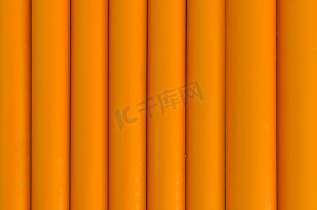 橙色塑料管材图案纹理背景