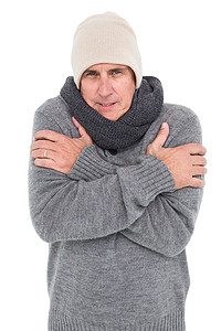 保暖衣物摄影照片_穿着暖和的衣服发抖的随便男人