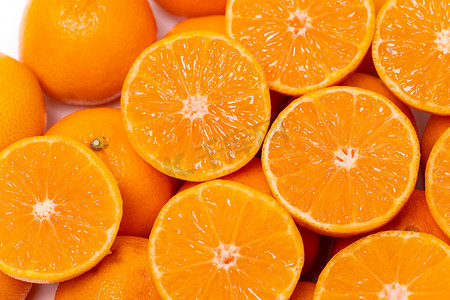 半圆圈摄影照片_一套切成两半的橘子