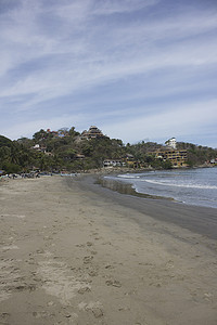 棕榈树页摄影照片_墨西哥的海滩上有大房子
