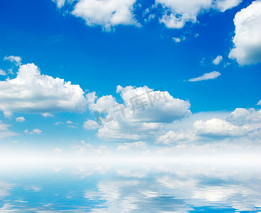 双十一主图大气摄影照片_白色蓬松的云朵，蓝天上有彩虹