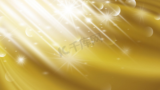 金色光效框摄影照片_具有光效背景的抽象金色奢华面料