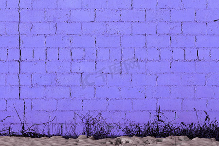 扁平纹理摄影照片_紫色石膏粗糙砖外墙纹理
