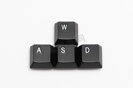 游戏图标按钮摄影照片_不同字母WASD键盘单黑键