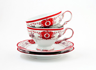 白色茶具摄影照片_孤立的金红色装饰复古茶具