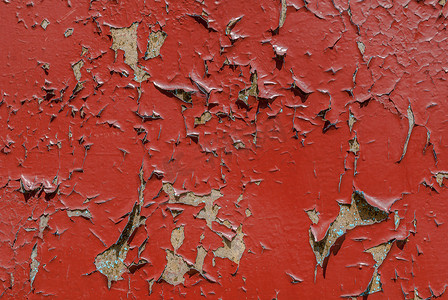 剥落的油漆摄影照片_旧木表面有裂缝和剥落的油漆、剥落的油漆、红色质地、背景