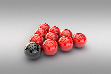 具有反射表面的红色和黑色光泽球的 3D 渲染