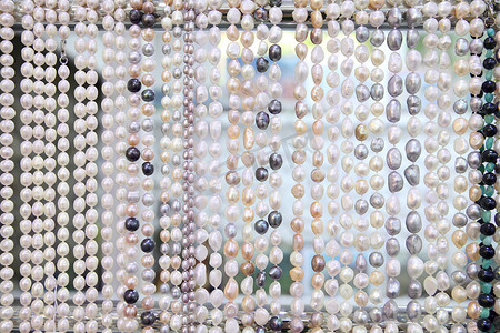 珍珠首饰摄影照片_从多彩多姿的珍珠首饰的背景