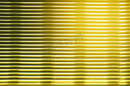 百叶窗光束摄影照片_带有阳光光束背景的百叶窗。
