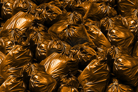 塑料袋，背景堆垃圾袋橙色，垃圾桶，垃圾，垃圾，垃圾，塑料袋堆