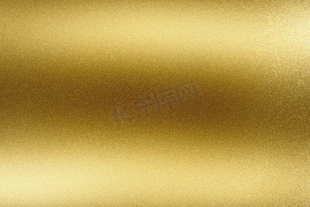 金黄背景摄影照片_抽象纹理背景，发光的粗砺的金黄钢管