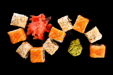 寿司食物摄影照片_卷起美味的寿司