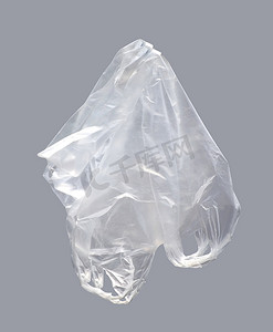 污染塑料袋摄影照片_塑料袋，灰色背景中的透明塑料袋，塑料袋清除垃圾，塑料袋清除垃圾，垃圾袋污染