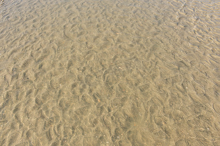 米色纹摄影照片_海洋砂纹