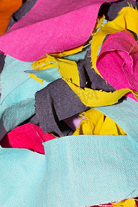 彩色拼凑图案摄影照片_背景彩色织物纺织品碎片